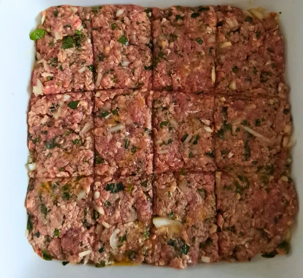 Easy Sheet Pan Kafta – Juicy, Herby & Ready in Minutes 20 Kafta mixture scored sheet pan ready