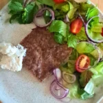 Easy Sheet Pan Kafta – Juicy, Herby & Ready in Minutes 25 Kafta plated fresh salad herbs
